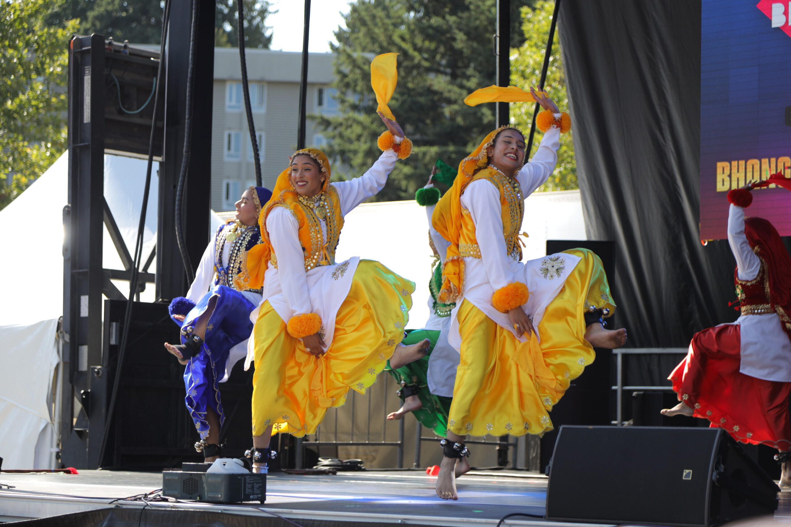 Bhangra X performers in traditional attire